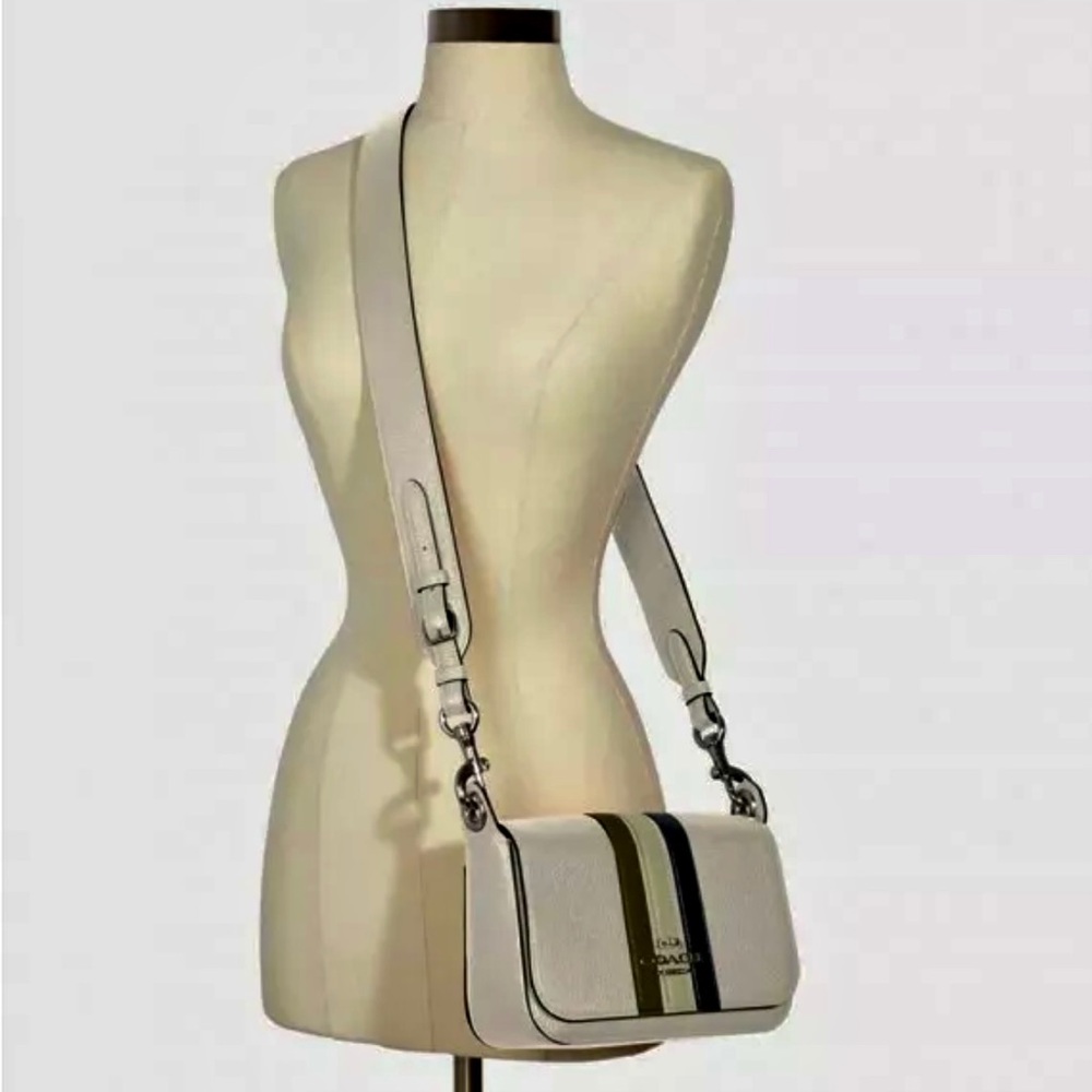 Coach Small Jes Messenger With Varsity Strip.